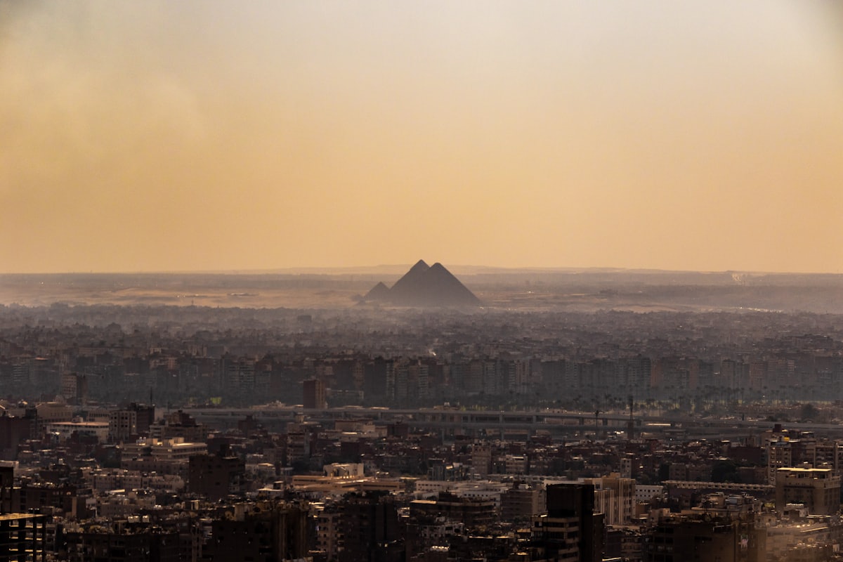 Cairo cityscape with the Pyramids in the distance