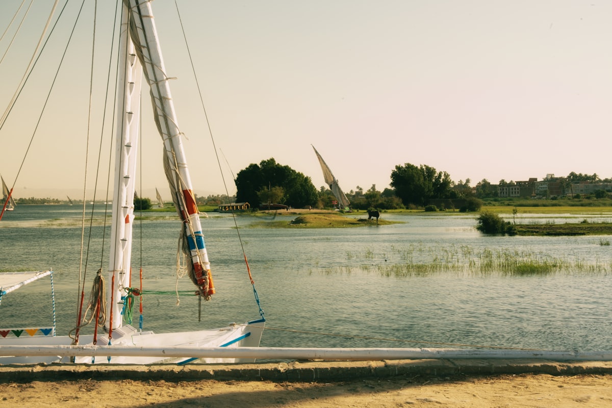 Traditional felucca sailing the Nile at sunset